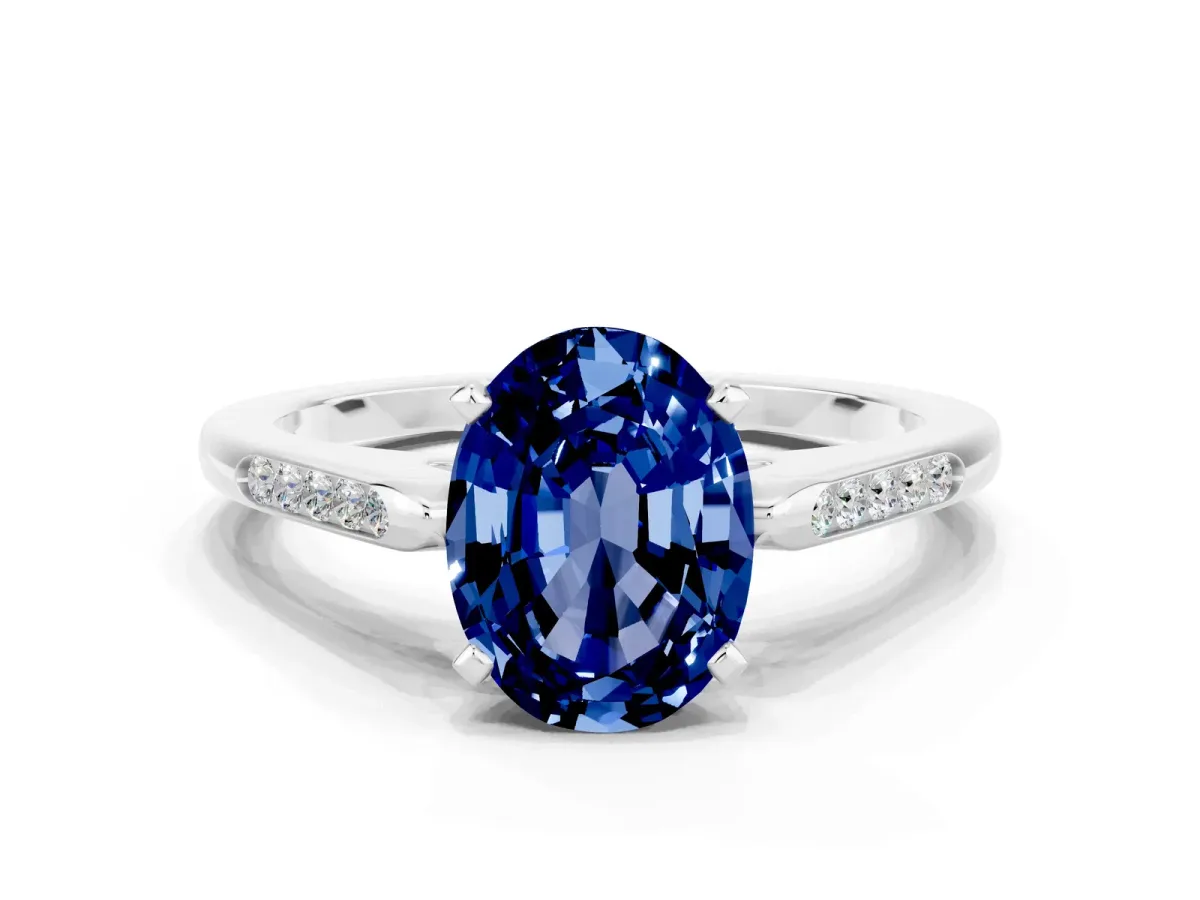 Oval Cut Blue Sapphire Solitaire Ring with Channel Set Round Band and Prong Setting Silver