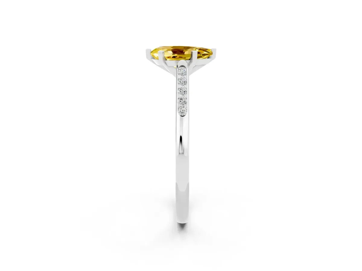 Pear Cut Yellow Sapphire Solitaire Ring with Channel Set Round Band and Prong Setting Silver