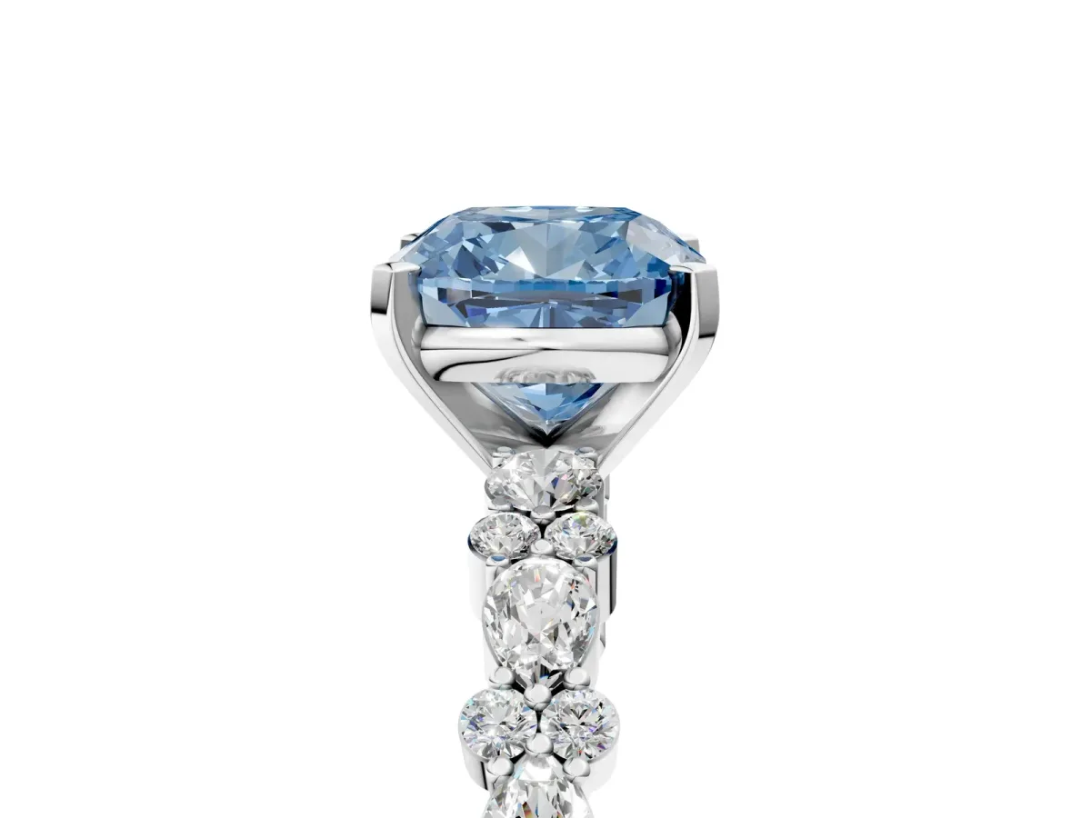 Fancy Blue Cushion Cut Diamond Side Stone Solitaire Ring with Round and Four-Prong Setting White gold