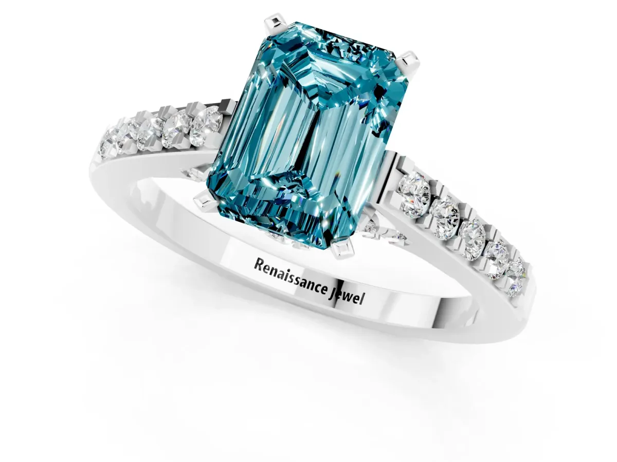 Emerald Cut Blue Topaz Solitaire Ring with Crossover Gallery and Round Pavé Band Silver