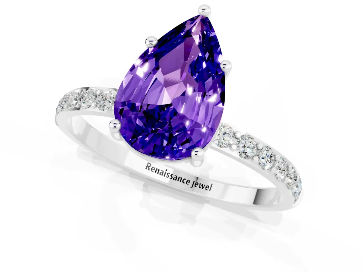 Pear Cut Tanzanite Solitaire Ring with Round Pavé Shoulders and Prong Setting White gold