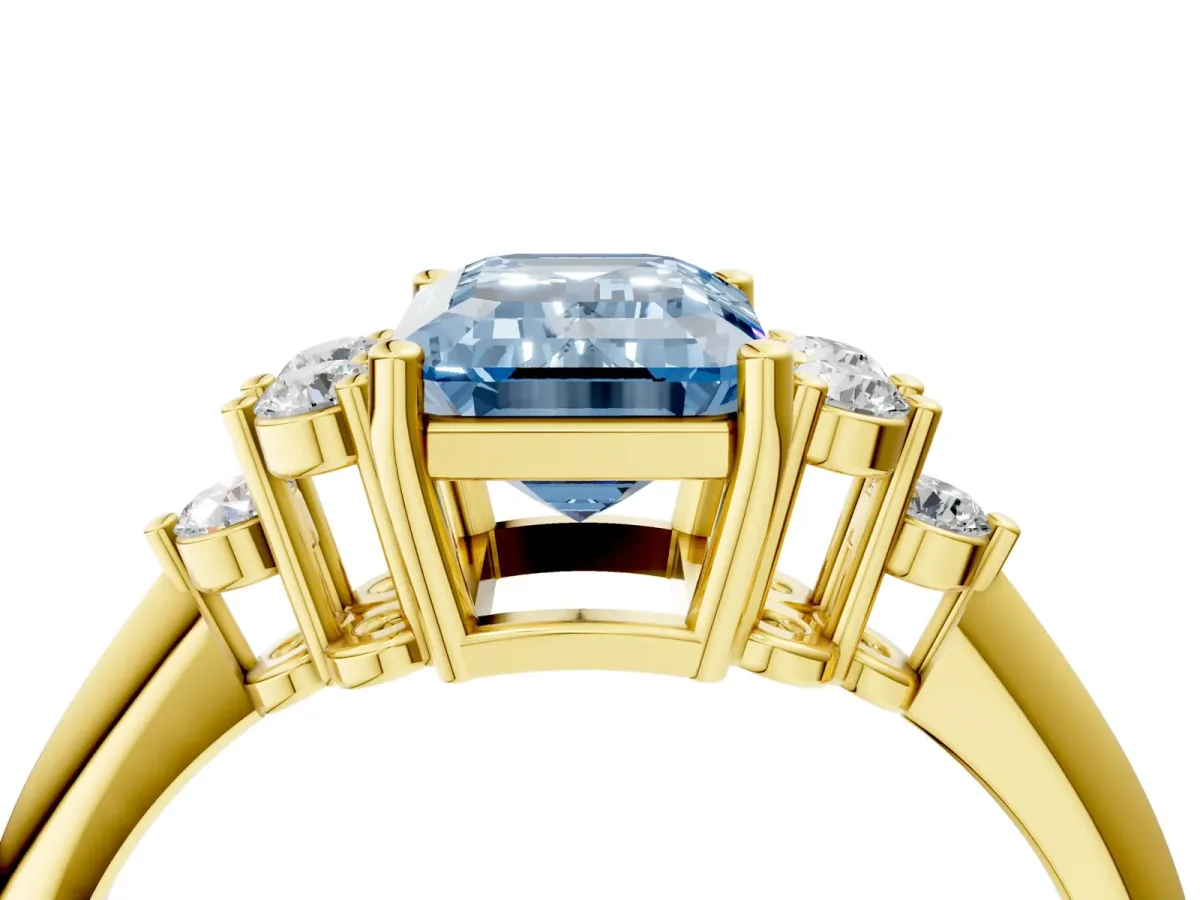 Fancy Blue Emerald Cut Cut Diamond Cluster Ring with Solitaire Band and Four-Prong Setting Yellow gold