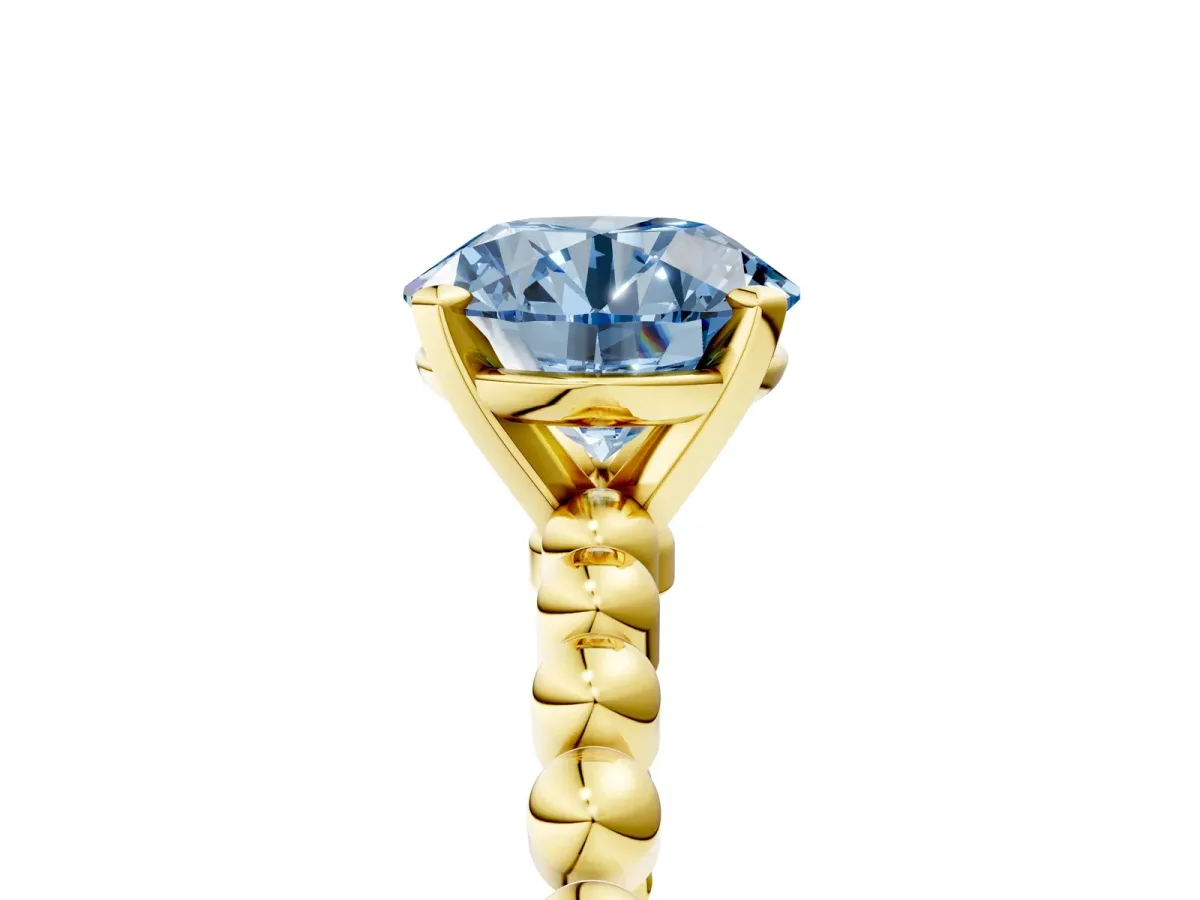 Fancy Blue Round Cut Diamond Solitaire Ring with Beaded Band and Prong Setting Yellow gold