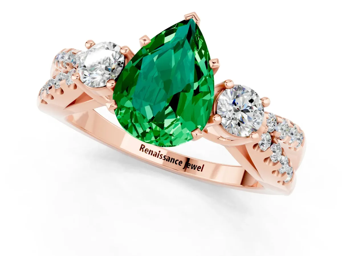 Pear Cut Emerald Three-Stone Ring with Pavé Split Shank and Four-Prong Setting Rose gold