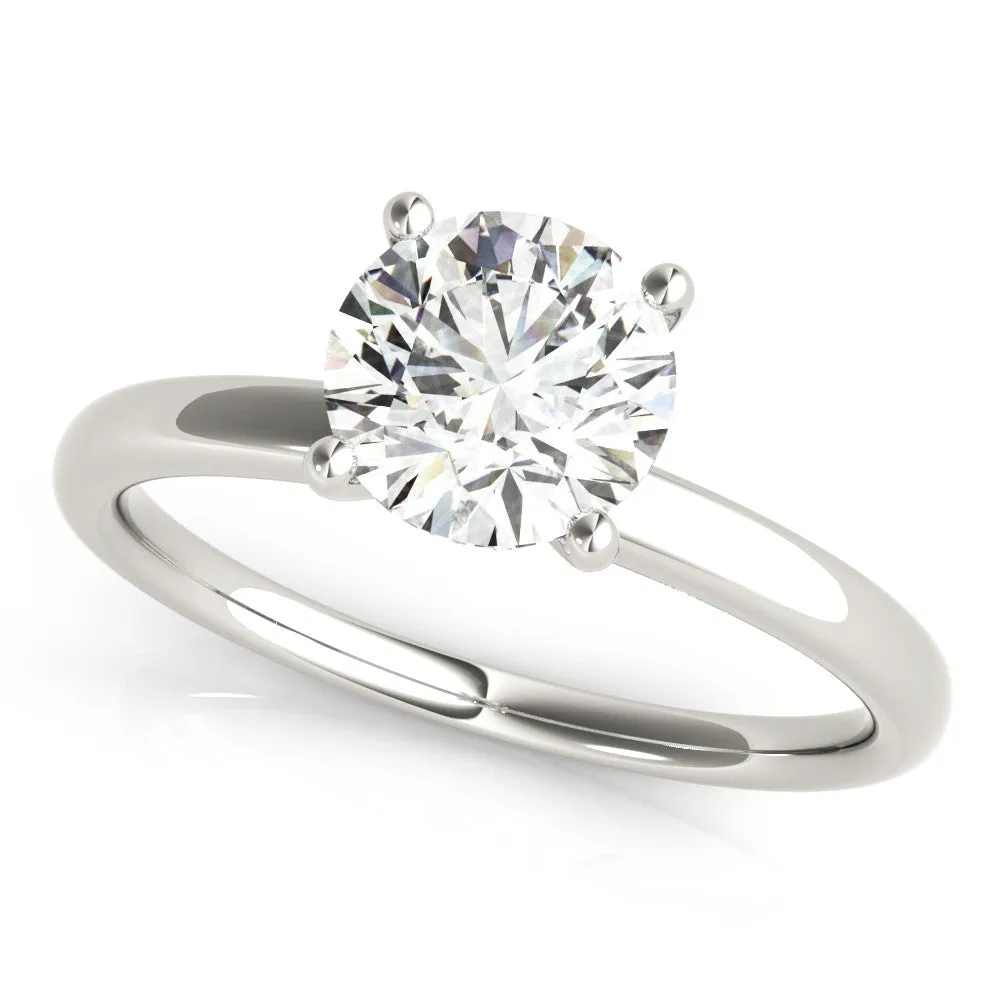 Round Cut Diamond Solitaire Ring with Classic Band and Four-Prong Setting Silver