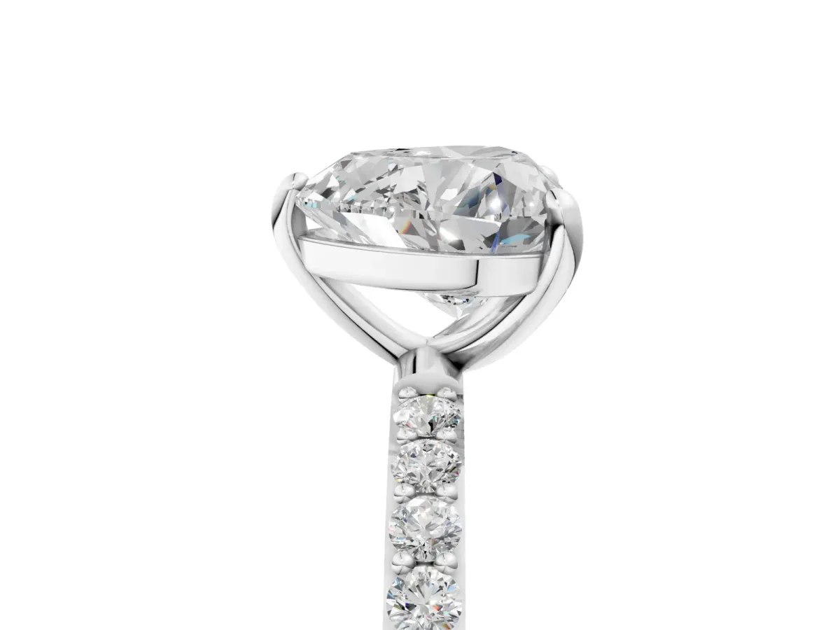 Heart Cut Diamond Solitaire Ring with Round Pavé Band and Prong Setting Silver