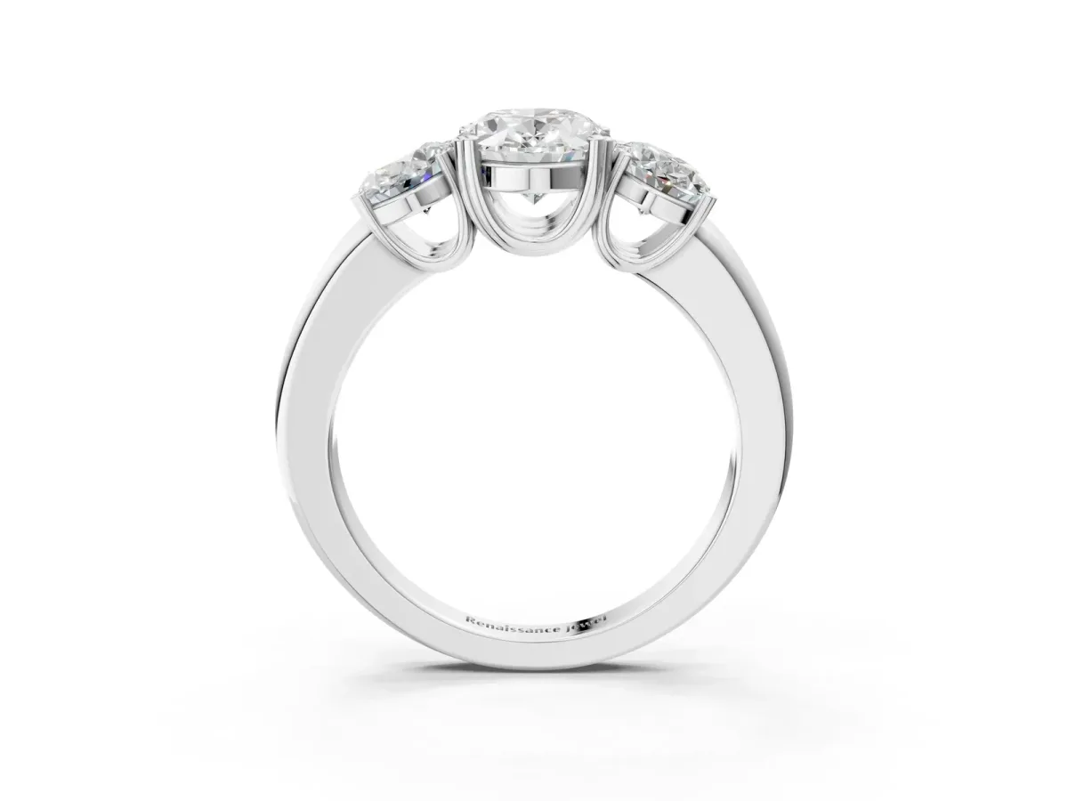 Three-Stone Oval Cut Cut Diamond Ring with Channel Set Band and Four-Prong Setting White gold