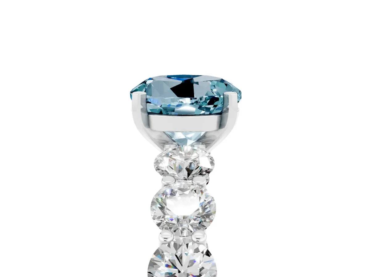 Round Cut Aquamarine Prong Setting with Side Stones on a Pave Band Silver