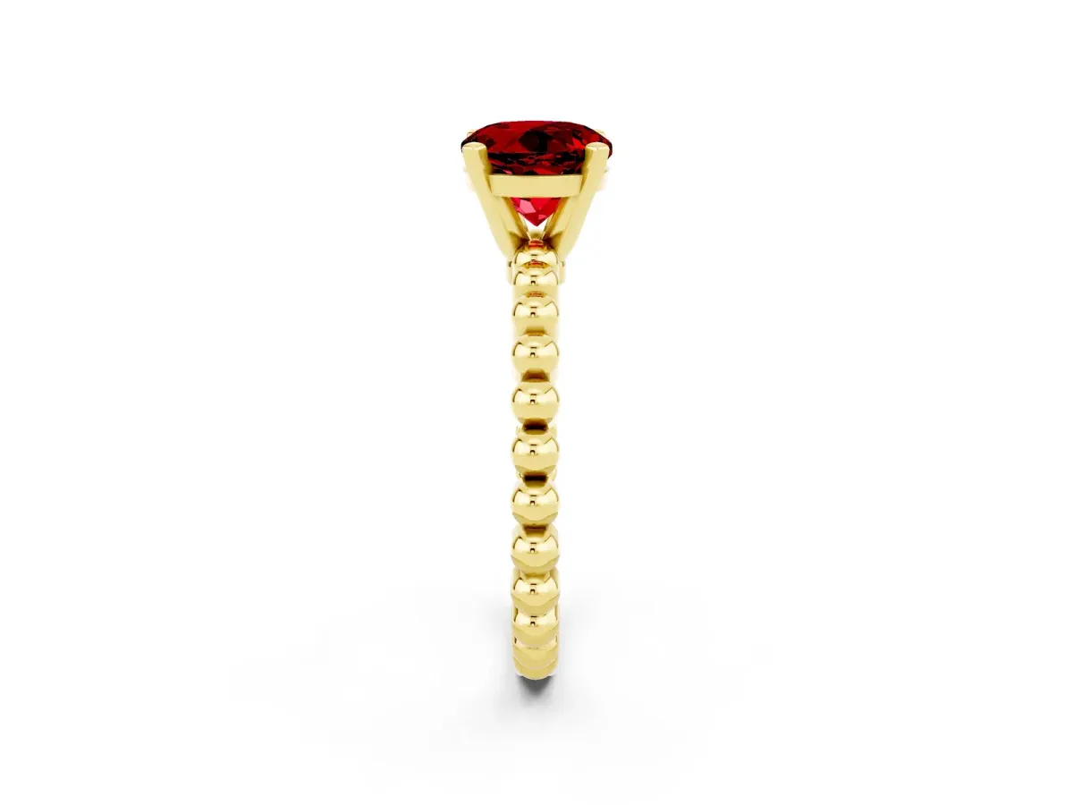 Round Cut Ruby Solitaire Ring with Beaded Band and Prong Setting Yellow gold