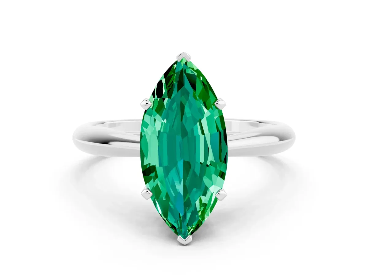 Marquise Cut Emerald Solitaire Engagement Ring with Cathedral Setting and Four-Prong Mount White gold