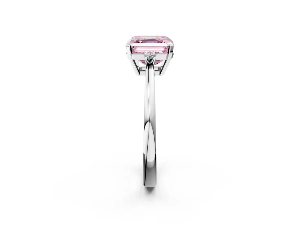 Fancy Pink Asscher Cut Cut Three-Stone Solitaire Ring with Round Accent Diamonds and Four-Prong Setting Platinum