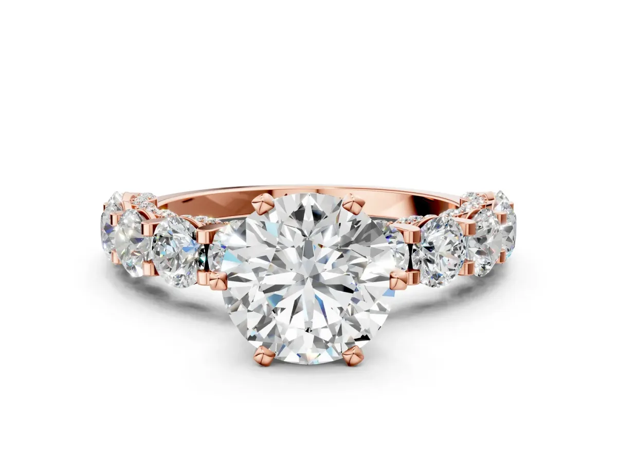 Round Cut Diamond Side Stone Engagement Ring with Four-Prong Setting Rose gold