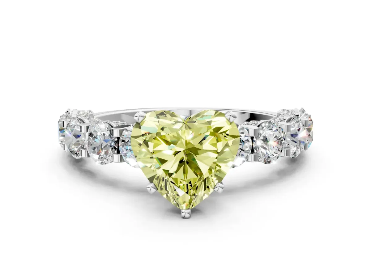 Fancy Yellow Heart Cut Diamond Side Stone Engagement Ring with Four-Prong Setting White gold