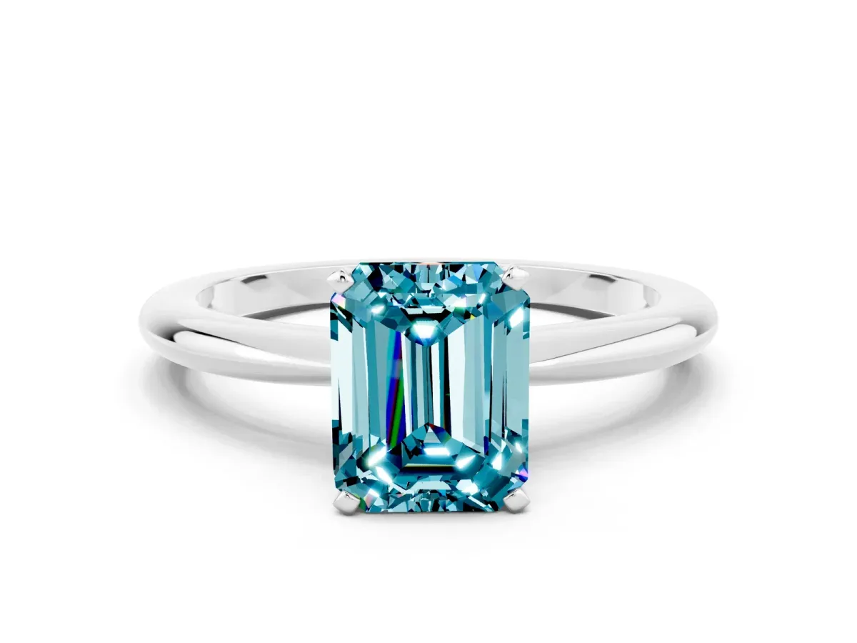 Emerald Cut Blue Topaz Solitaire Ring with Six-Prong Setting and Classic Band Silver