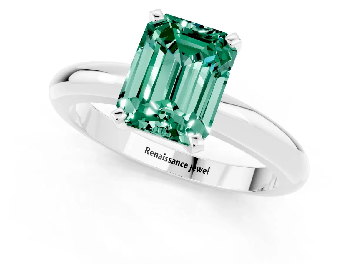 Emerald Cut Green Sapphire Solitaire Engagement Ring with Round Band and Four-Prong Setting Silver