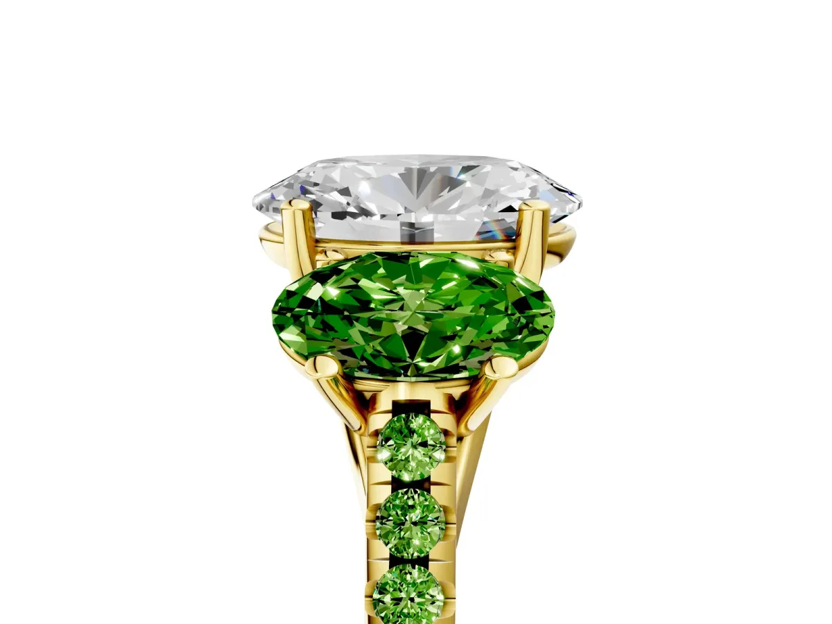 Three-Stone Oval Cut Diamond Ring with Round Peridot Pavé Band and Prong Setting Yellow gold