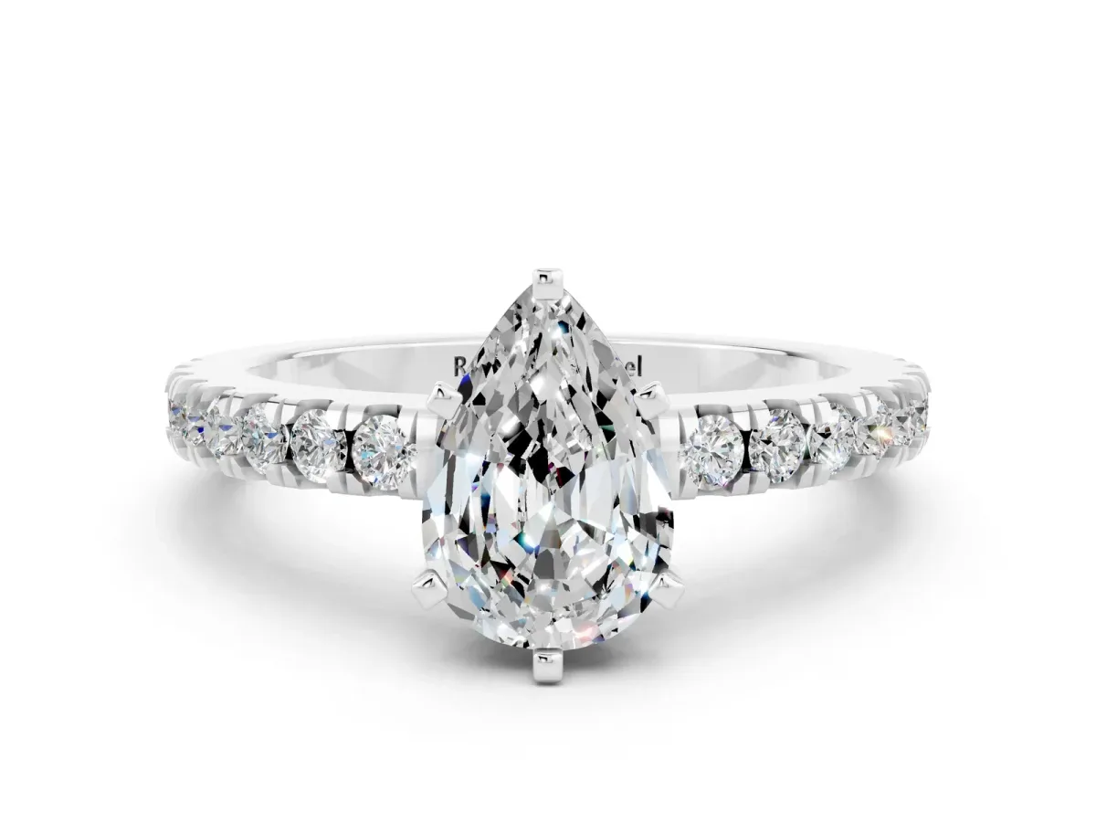Pear Cut Solitaire Moissanite with Pavé Band and Four-Prong Setting Silver