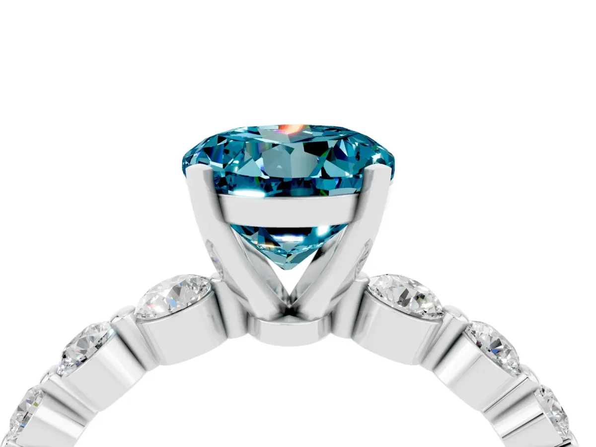 Round Cut Solitaire Blue Topaz Ring with Pave Band and Four-Prong Setting Silver