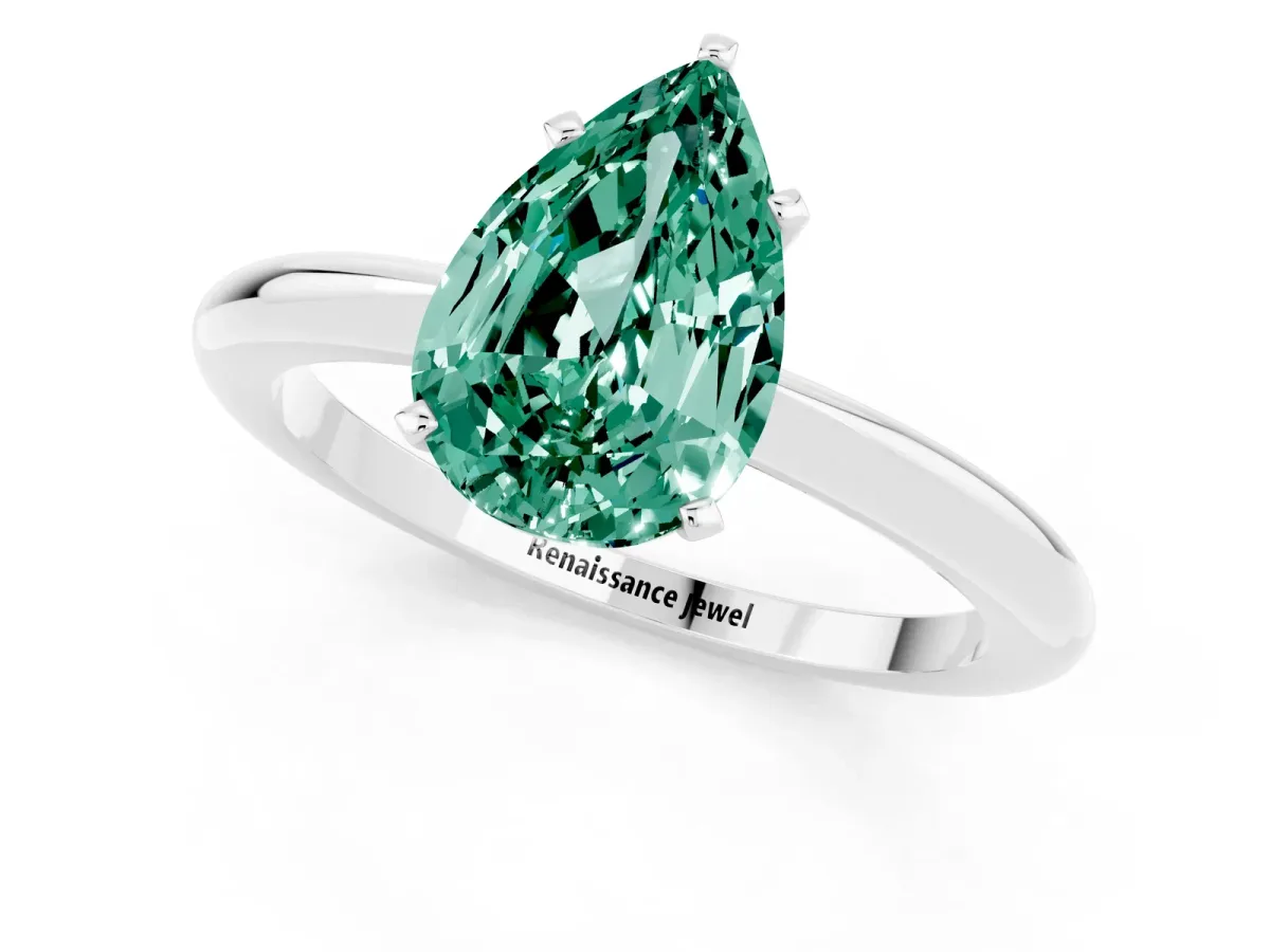 Pear Cut Green Sapphire Solitaire Ring with Six-Prong Setting and Classic Band Silver