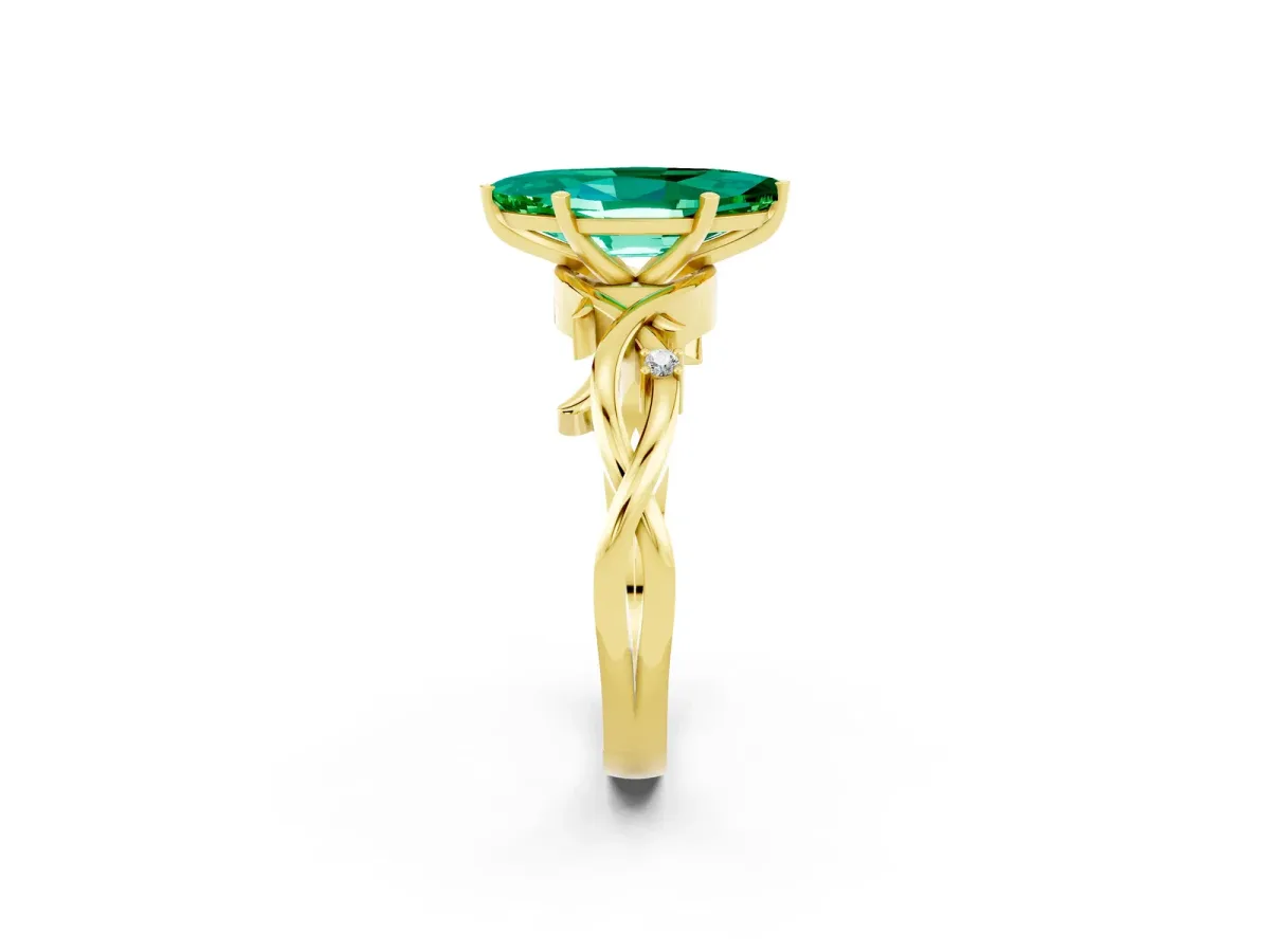 Marquise Cut Emerald Solitaire Ring with Twisted Band and Prong Setting Yellow gold