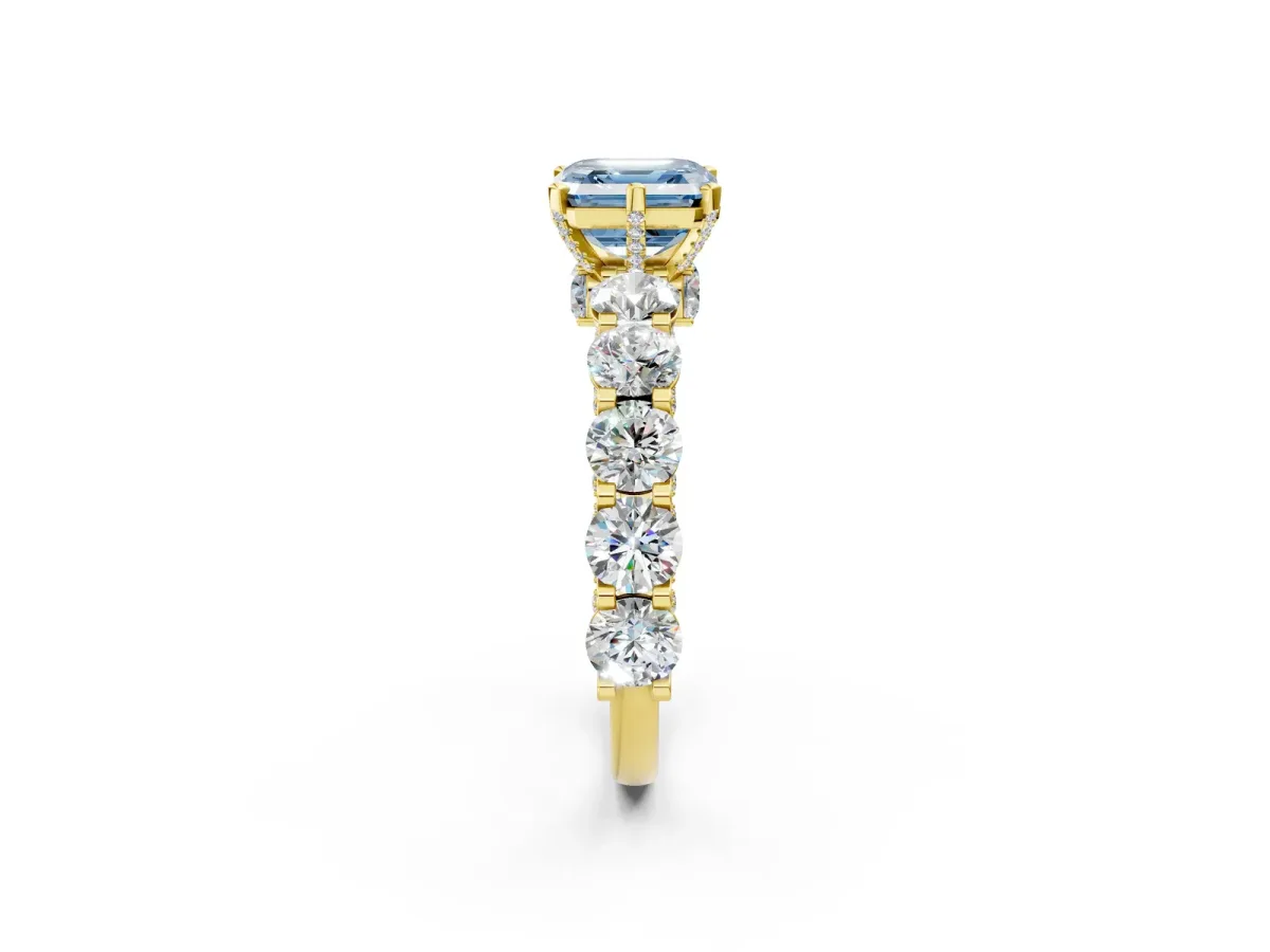 Fancy Blue Asscher Cut Diamond Side Stone Engagement Ring with Four-Prong Setting Yellow gold