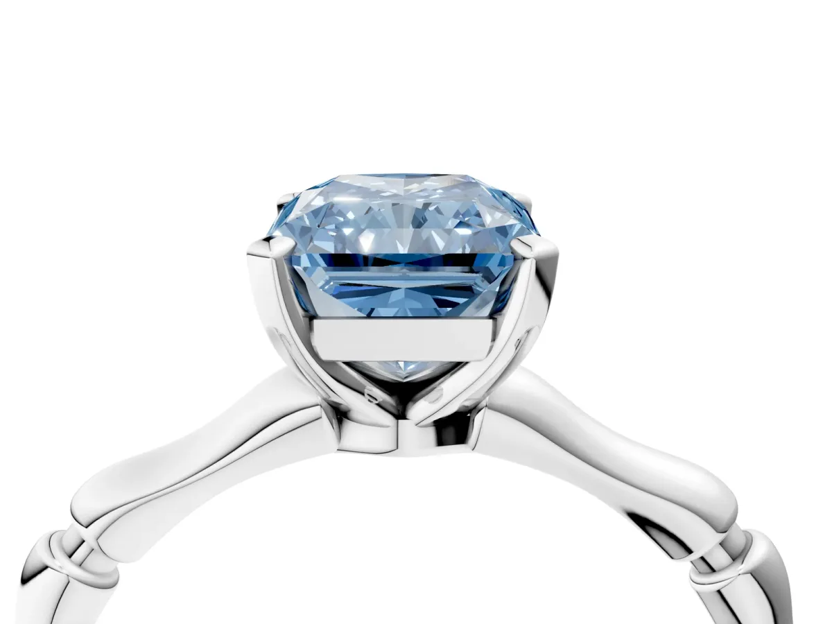 Fancy Blue Radiant Cut Solitaire Diamond Ring with Bamboo Band and Four-Prong Setting Platinum