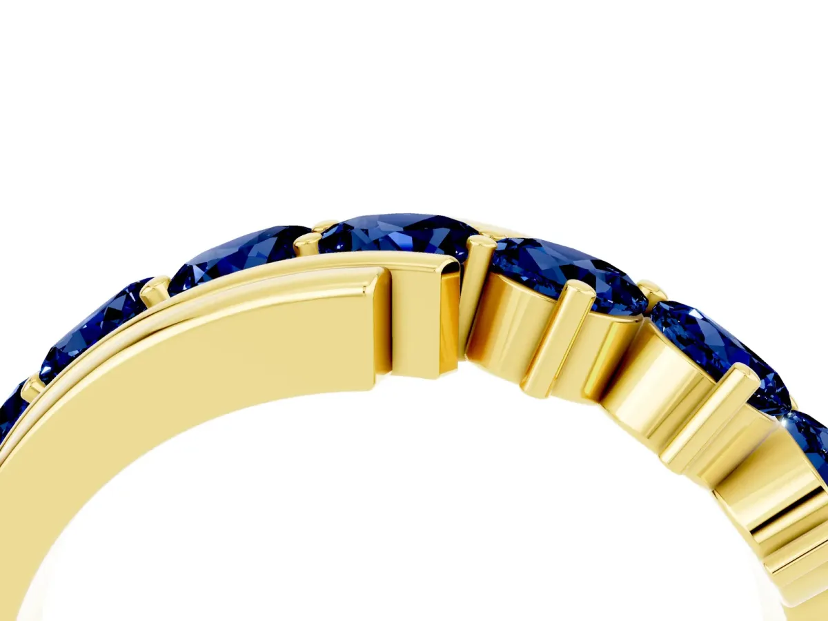 Round Blue Sapphire Wave Band with Channel and Shared Prong Setting Yellow gold