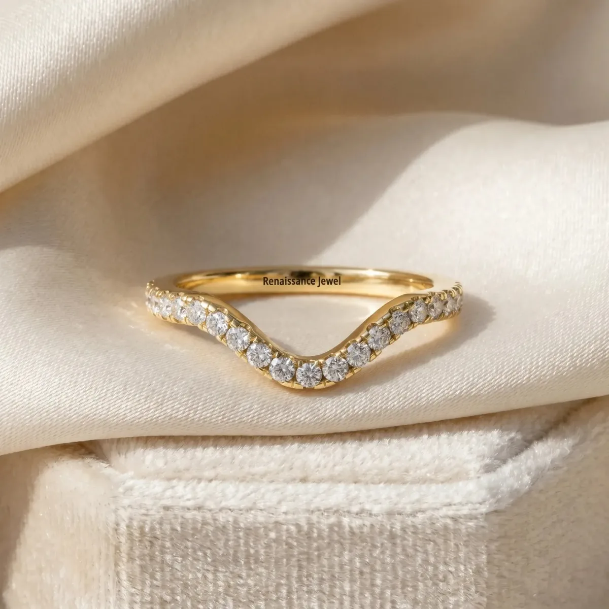 Pavé Round Diamond Infinity Twist Band with Shared Prong Setting Yellow gold