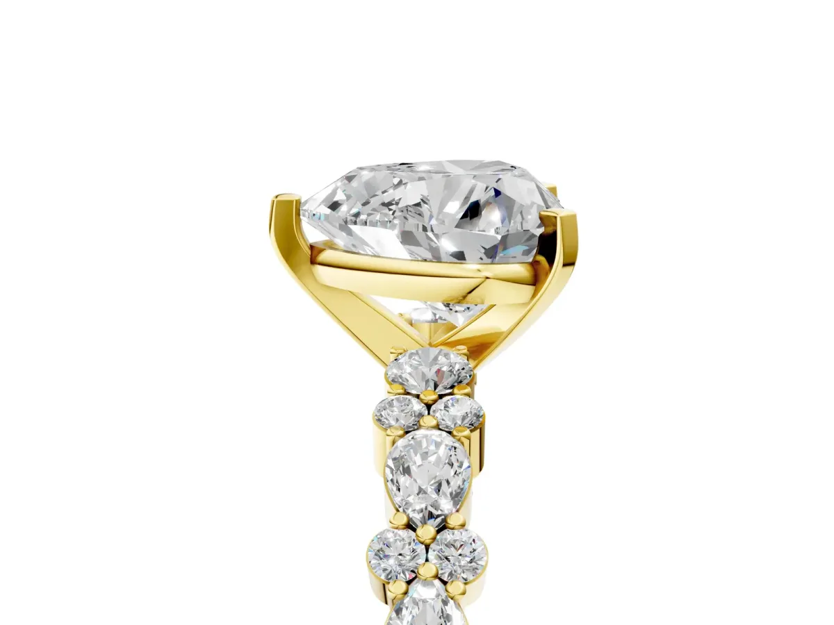 Heart Cut Diamond Side Stone Solitaire Ring with Round and Four-Prong Setting Yellow gold