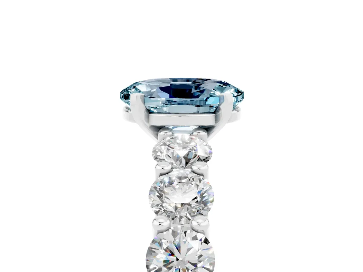 Oval Cut Aquamarine Prong Setting with Side Stones on a Pave Band Silver