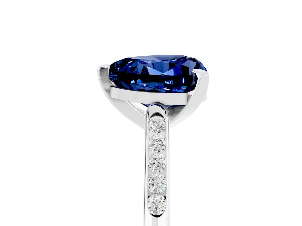 Heart Cut Blue Sapphire Solitaire Ring with Channel Set Round Band and Prong Setting Silver