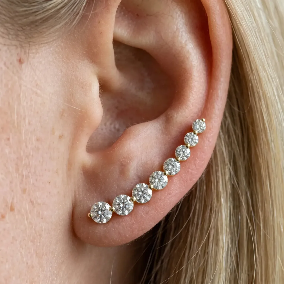 Round Diamond Climber Earrings with Prong Setting on Curved Band Yellow gold