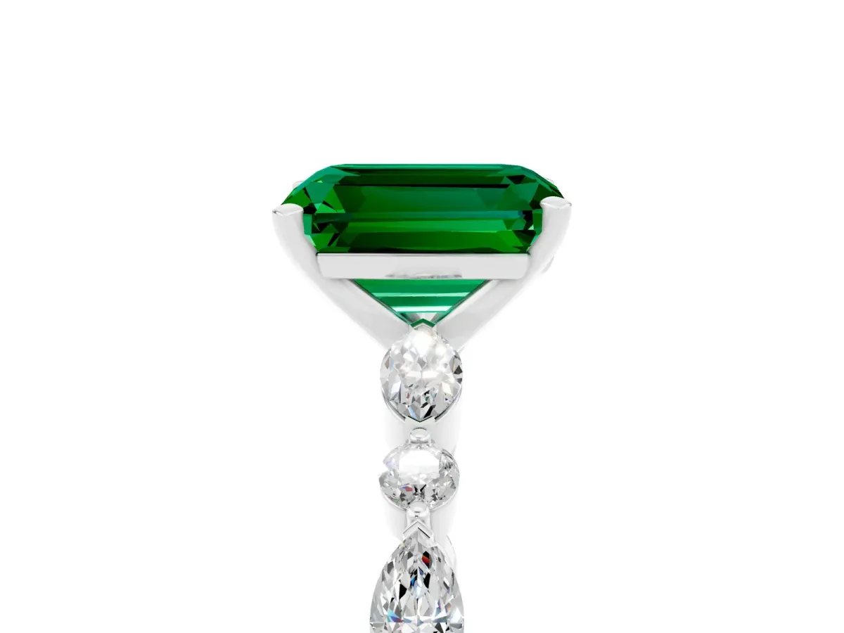 Emerald Cut Emerald Ring with Marquise and Round Side Stones and Four-Prong Setting Silver