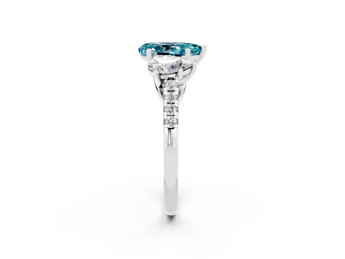 Three-Stone Pear Cut Blue Topaz Ring with Round Pavé Band and Prong Setting Silver
