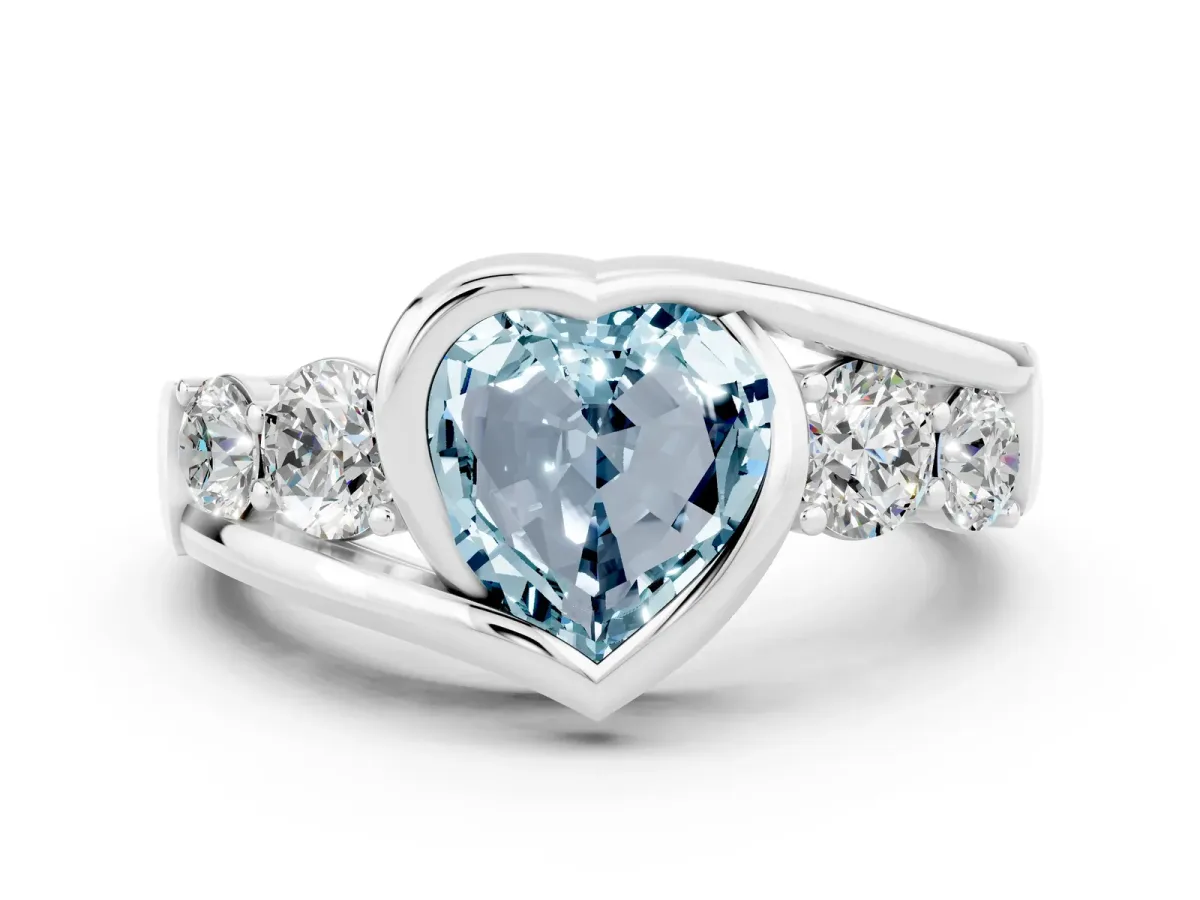 Bezel Set Heart Cut Aquamarine Bypass Ring with Round Accents Silver