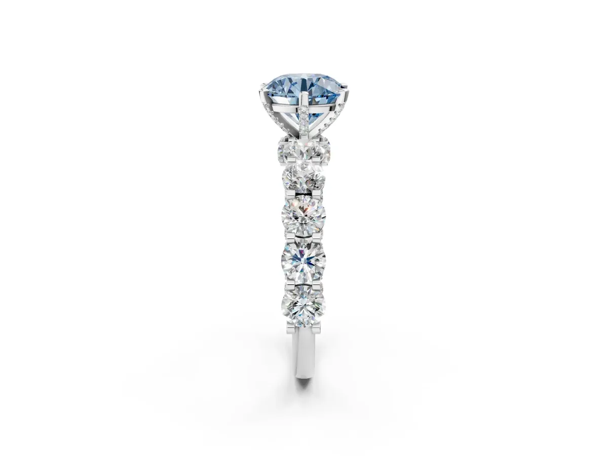 Fancy Blue Round Cut Diamond Side Stone Engagement Ring with Four-Prong Setting White gold