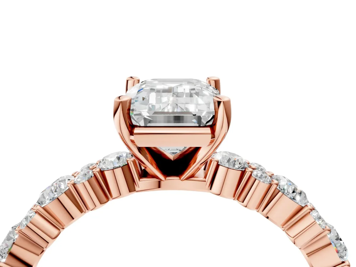 Emerald Cut Diamond Side Stone Solitaire Ring with Round Moissanite and Four-Prong Setting Rose gold