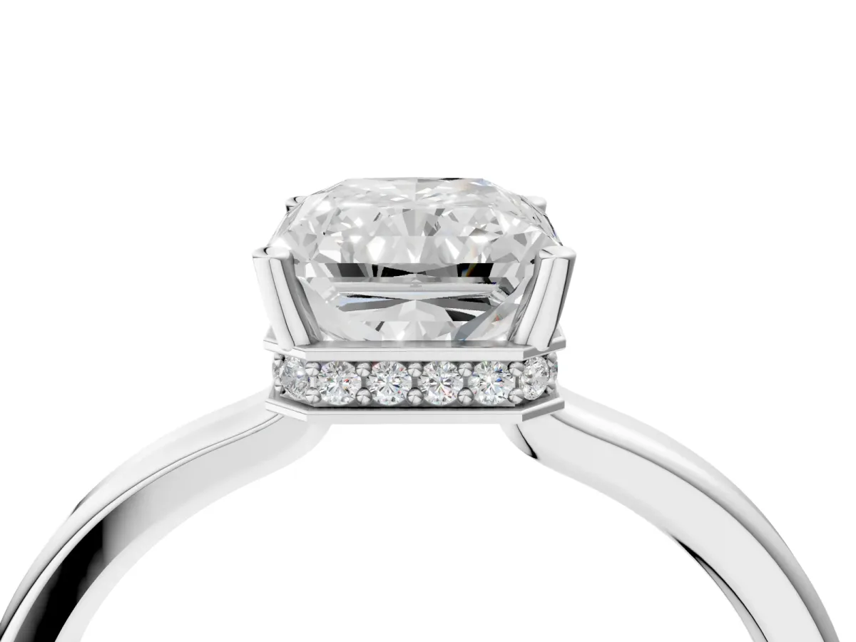 Radiant Cut Cut Solitaire Engagement Ring with Four-Prong Setting on a Classic Band Platinum