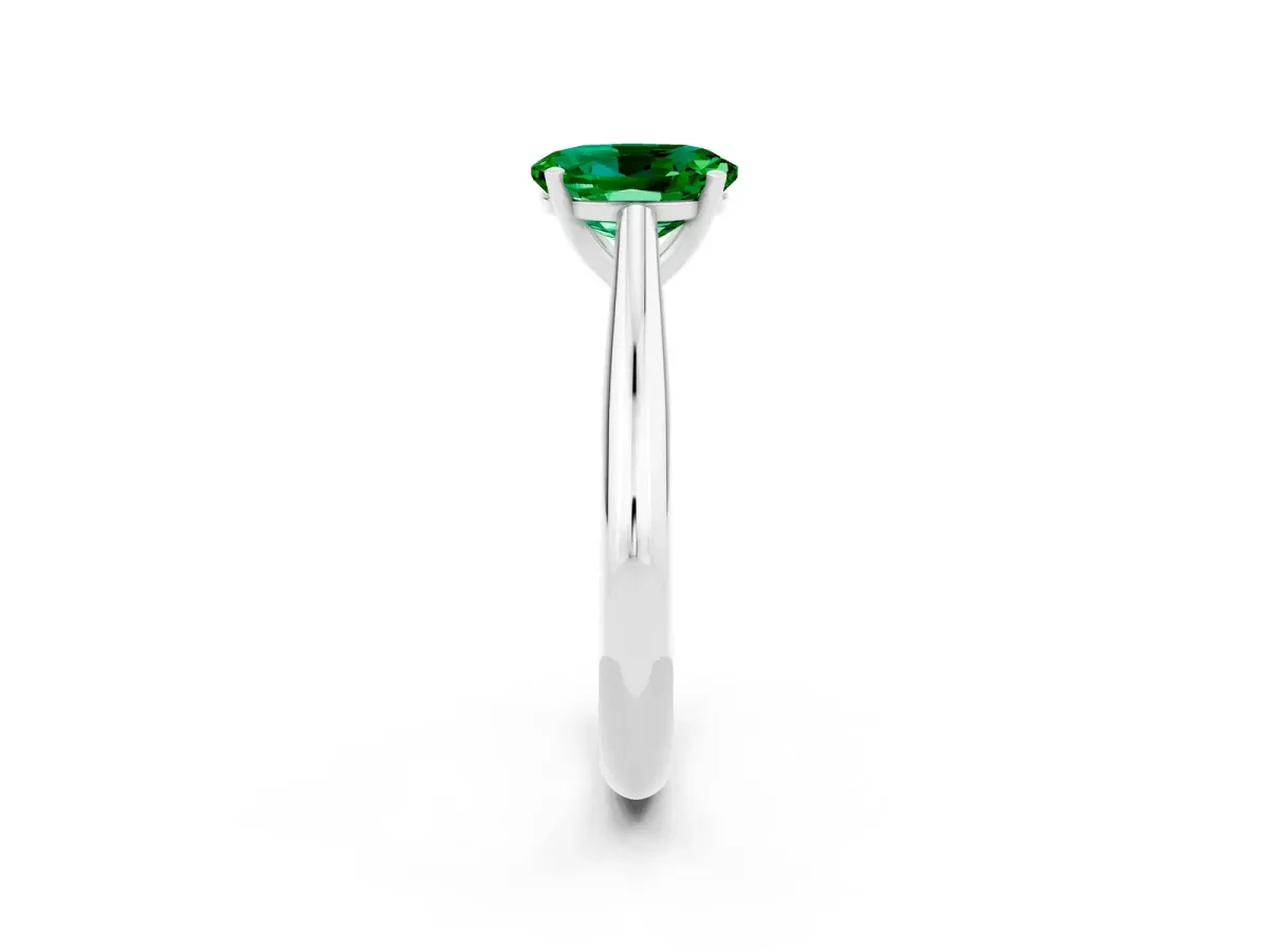 Oval Cut Emerald Solitaire Engagement Ring with Cathedral Setting and Four-Prong Mount White gold