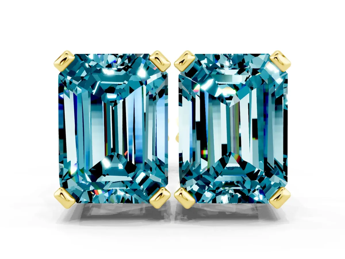 Emerald Cut Blue Topaz Stud Earrings Yellow gold