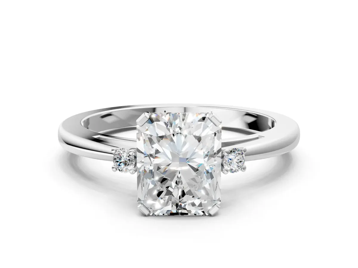 Radiant Cut Cut Three-Stone Solitaire Ring with Round Accent Diamonds and Four-Prong Setting Platinum