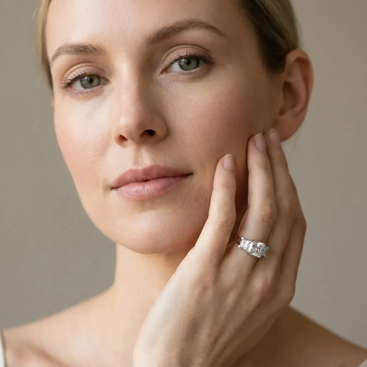 Three-Stone Princess Cut Cut Diamond Ring with Channel Set Band and Four-Prong Setting Platinum