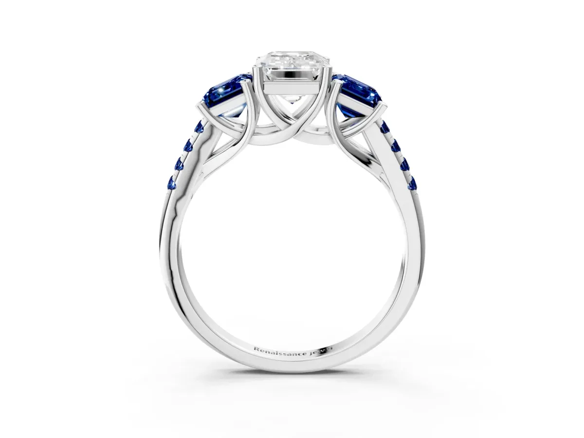 Three-Stone Emerald Cut Diamond Ring with Round Blue Sapphire Pavé Band and Prong Setting Silver