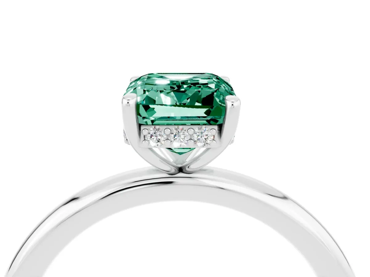 Emerald Cut Green Sapphire Solitaire Ring with Thin Band and Four-Prong Setting White gold