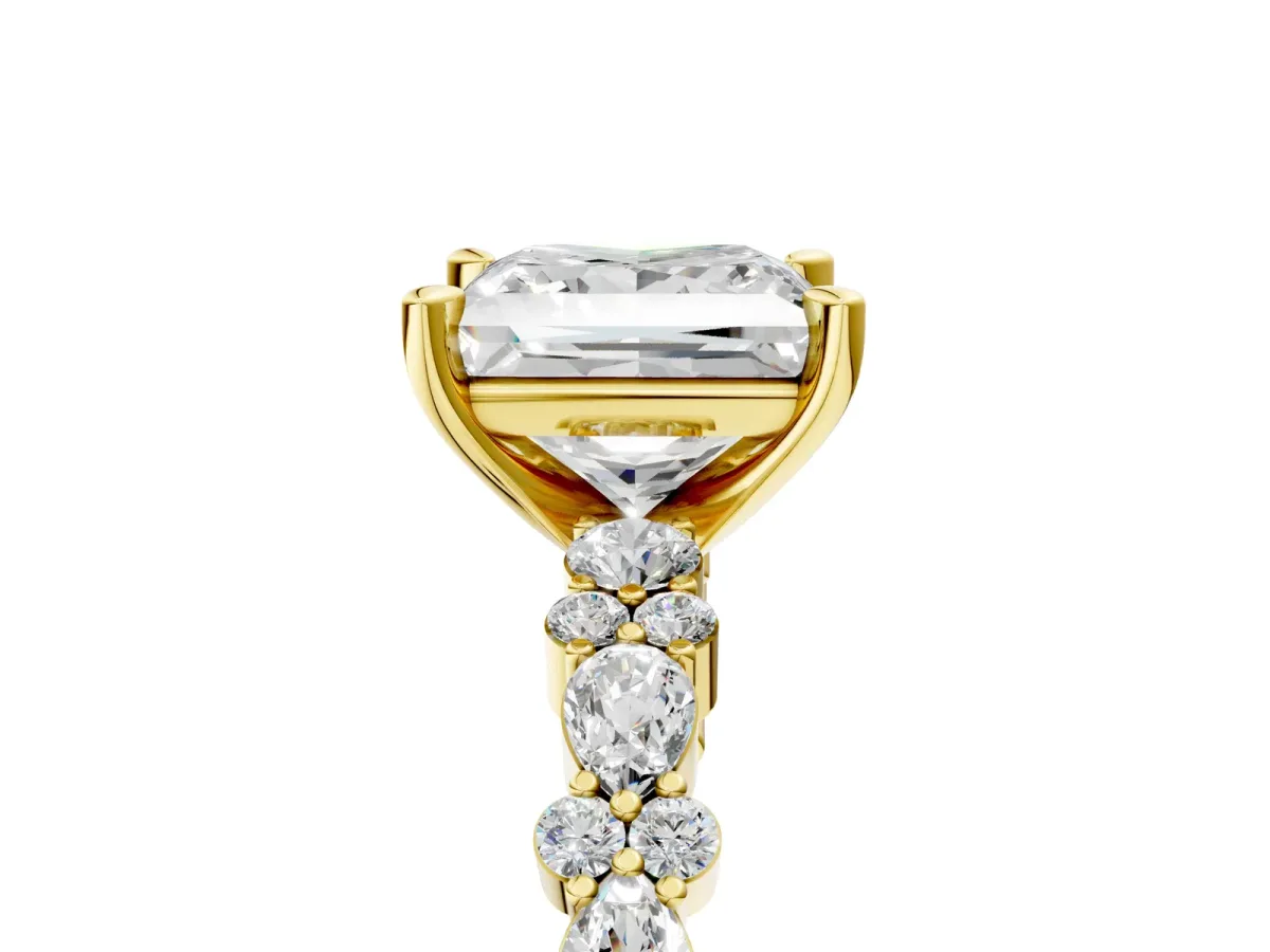 Princess Cut Diamond Side Stone Solitaire Ring with Round and Four-Prong Setting Yellow gold