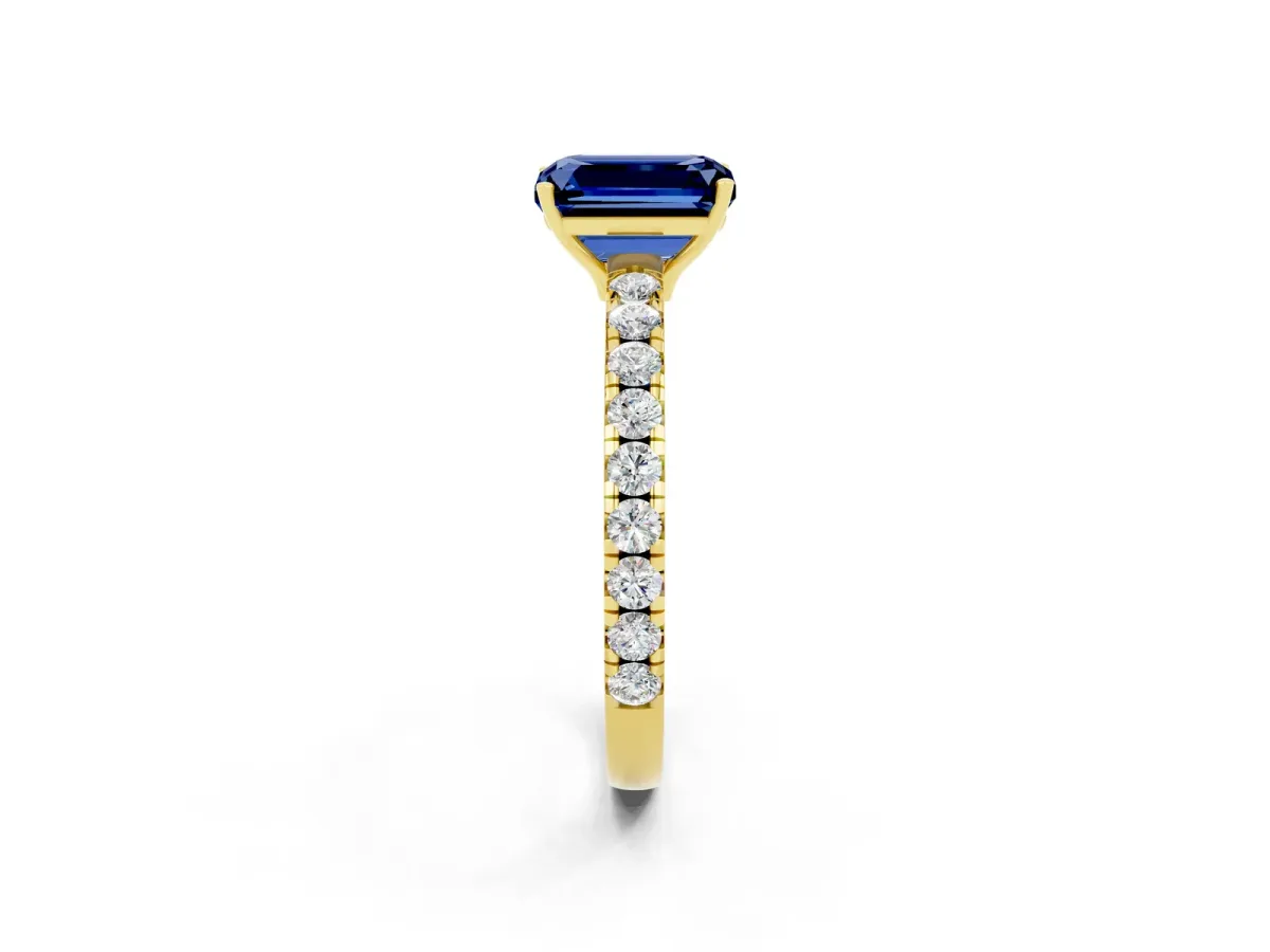 Emerald Cut Blue Sapphire Pavé Solitaire Engagement Ring with Four-Prong Setting Yellow gold