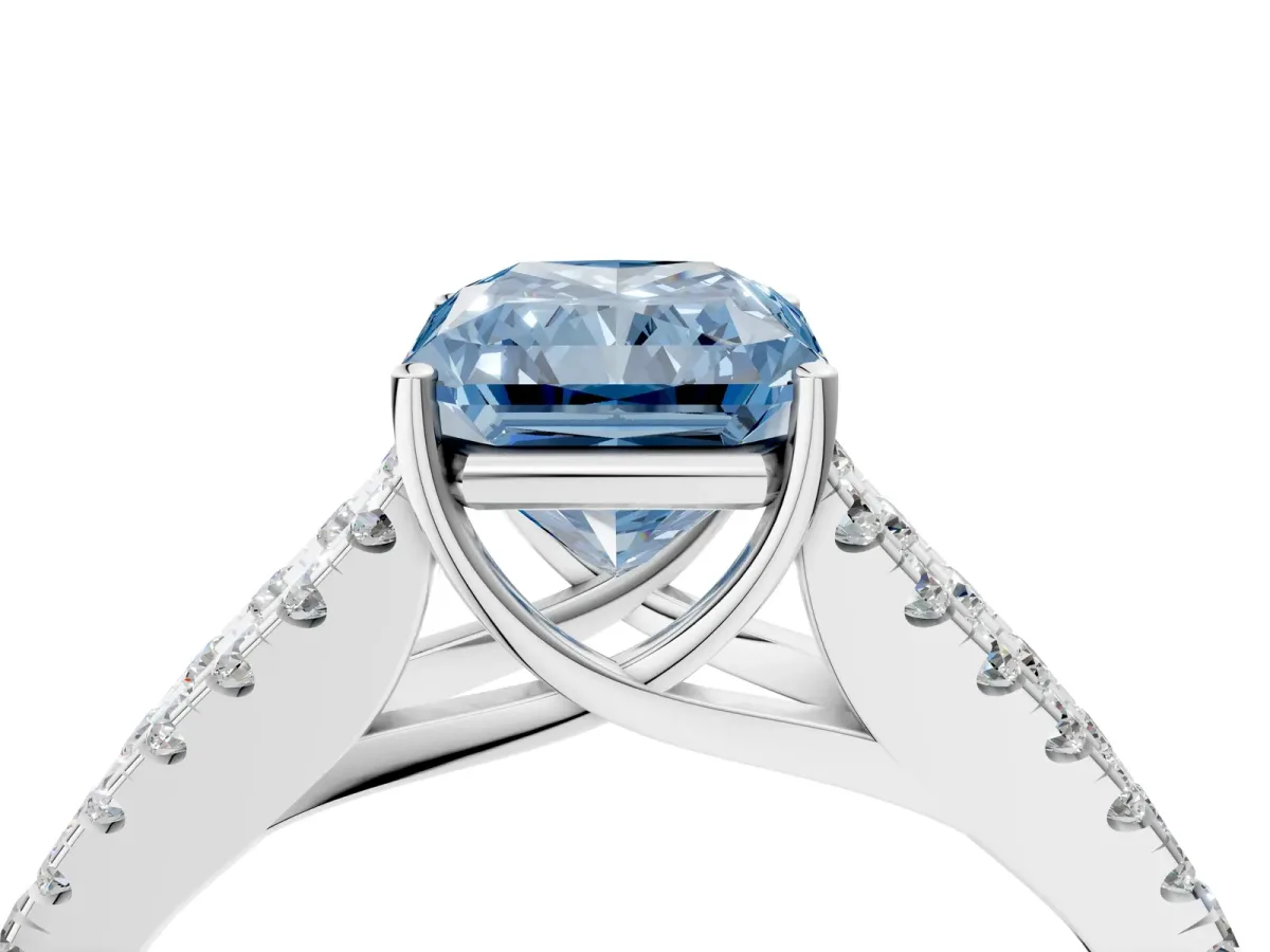 Fancy Blue Radiant Cut Diamond Split Shank Pavé Engagement Ring with Four-Prong Setting White gold