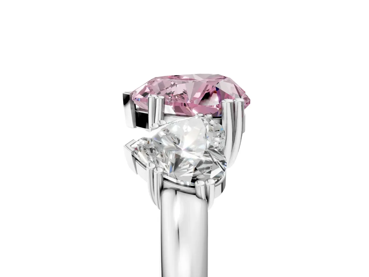 Fancy Pink Three-Stone Heart Cut Cut Diamond Ring with Channel Set Band and Four-Prong Setting Silver