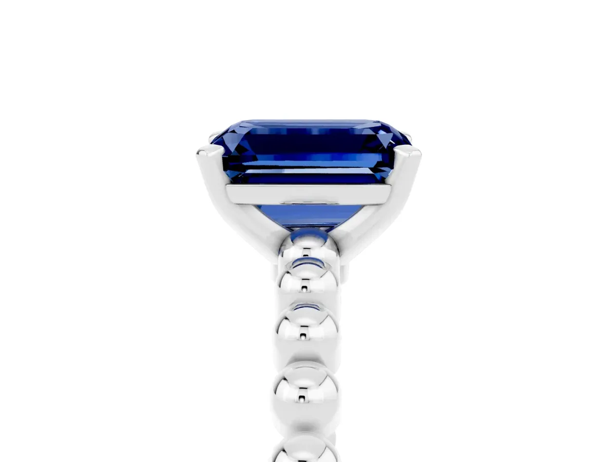 Emerald Cut Blue Sapphire Solitaire Ring with Beaded Band and Prong Setting White gold