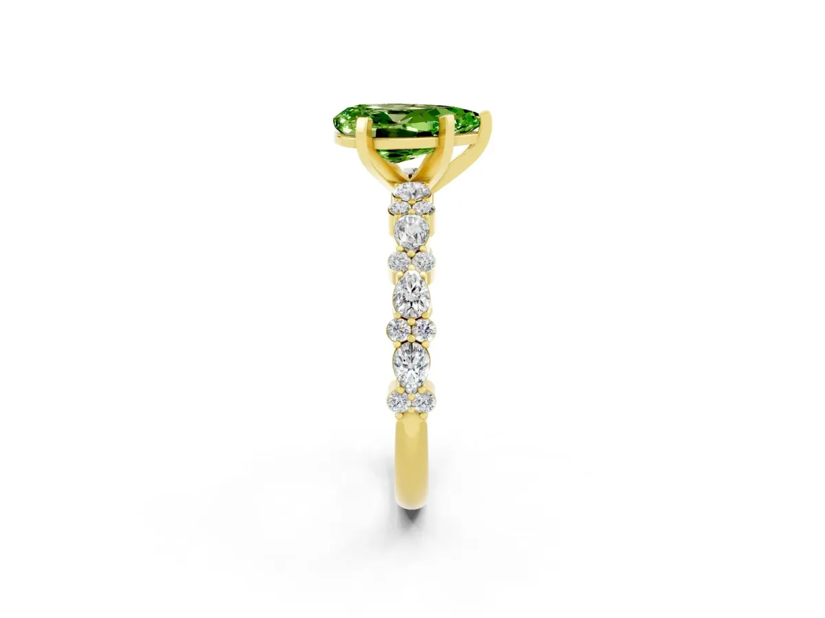 Pear Cut Peridot Side Stone Solitaire Ring with Round and Four-Prong Setting Yellow gold